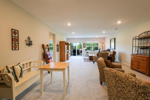 Huge family room with walk-out to concrete patio.