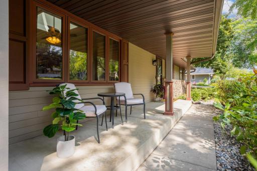 lovely approach to entrance of home & a relaxing patio to sip your morning coffee.