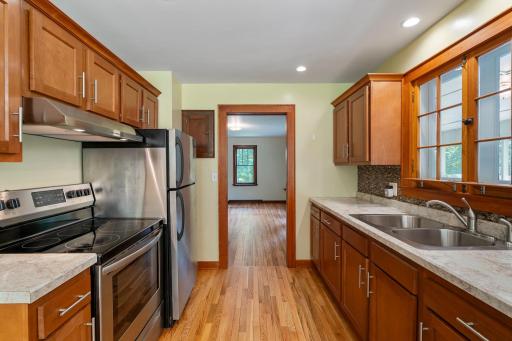 Stainless steel appliances and gorgeous floors.