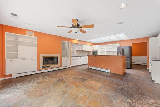 Gas fireplace to add ambiance to the dining area.
