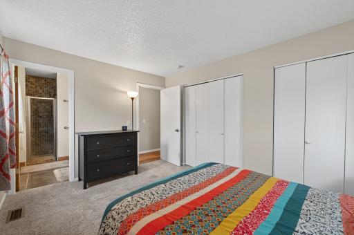 The primary bedroom has a private 3/4 bath and double closets