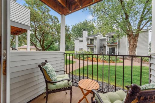 Private patio overlooking shared perennial gardens