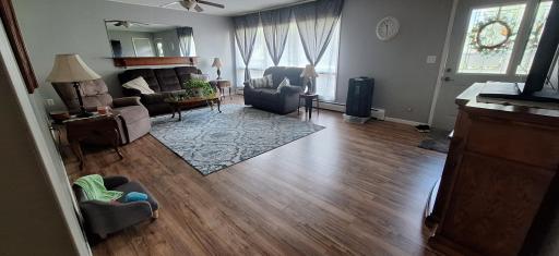 Huge living room with lots of natural light.