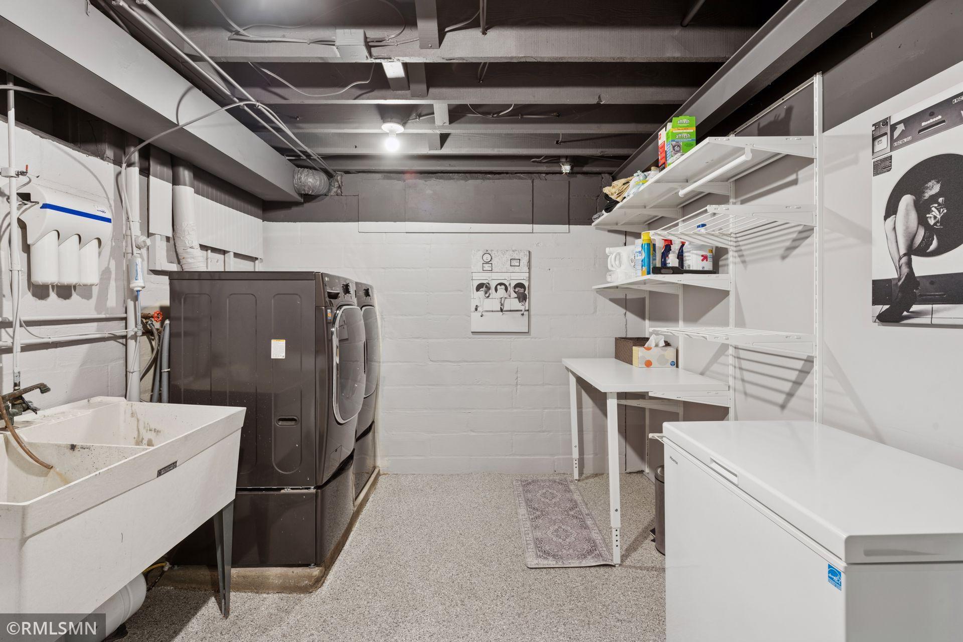 Big bright laundry room with updated machines