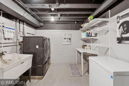Big bright laundry room with updated machines