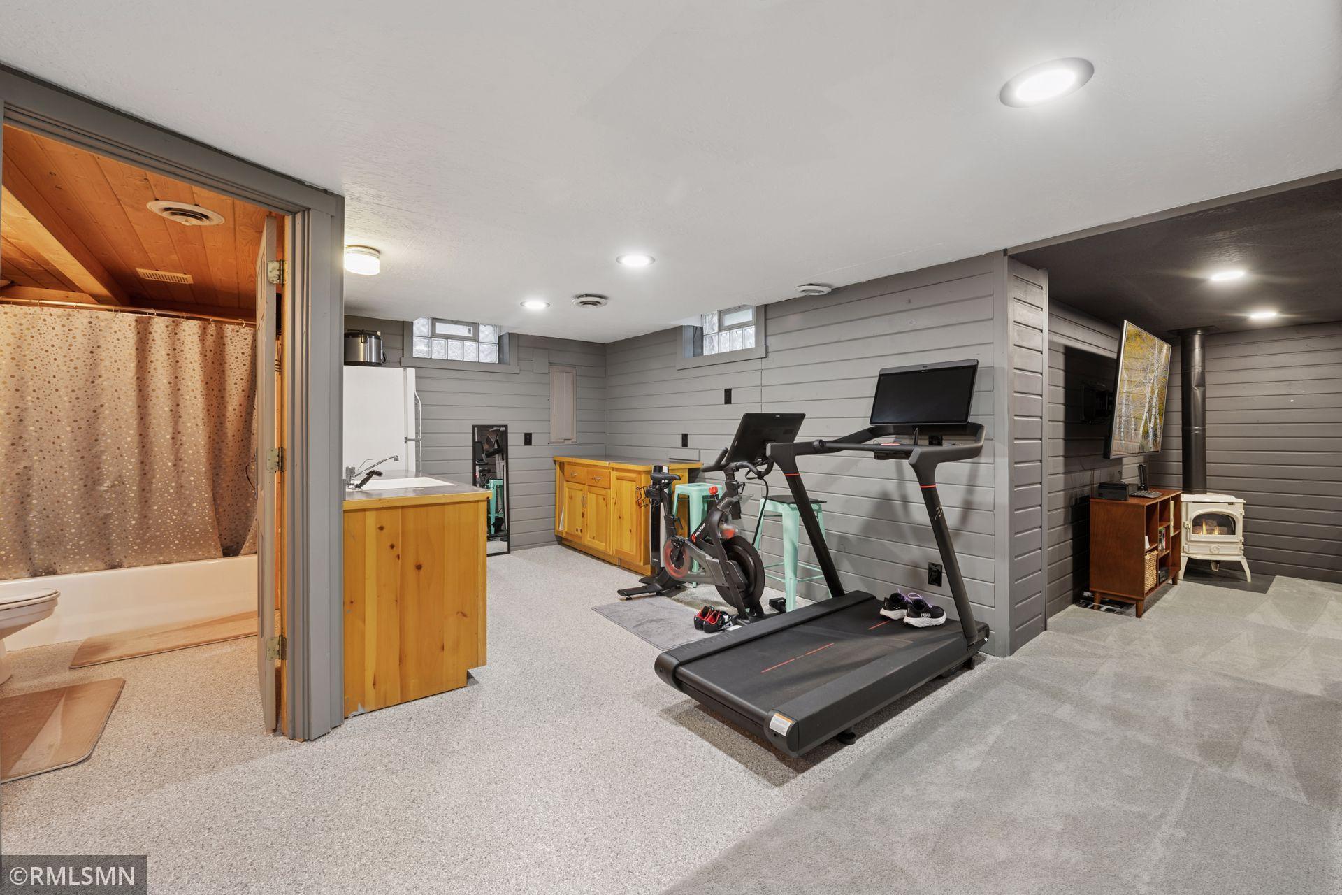 Downstairs has kitchenette, full bath and family room with all new flooring