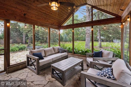Looks out to stunning, half-acre, fully landscaped property