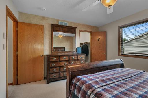 Primary suite highlights include a generous walk-in closet and space for larger furniture pieces, blending function and comfort seamlessly.
