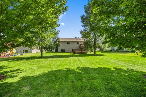 Expansive backyard with mature trees and room to play. Tucked in a cul-de-sac, this peaceful setting offers minimal traffic and maximum space.