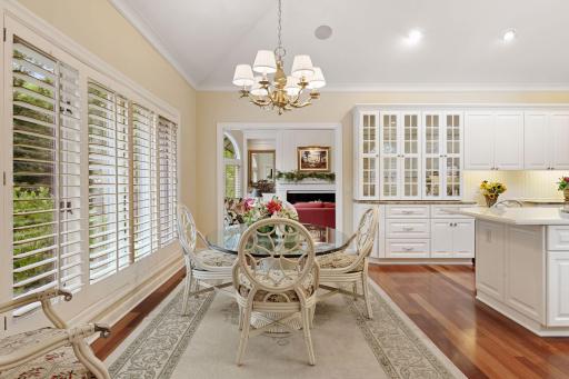 The sunny and bright kitchen includes walls of windows, all new hardware, new appliances, new lighting fixtures