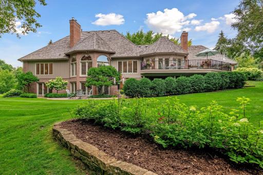 The large deck and lower level paver patio all were created to take advantage of the private views