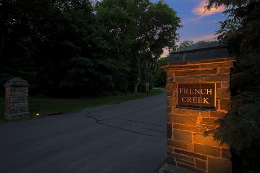 French Creek was designed to be a very special neighborhood with winding private road with timeless homes and achitecture that are perfectly positioned to offer privacy and nature views amongst mature trees creating a unique feeling of serenity