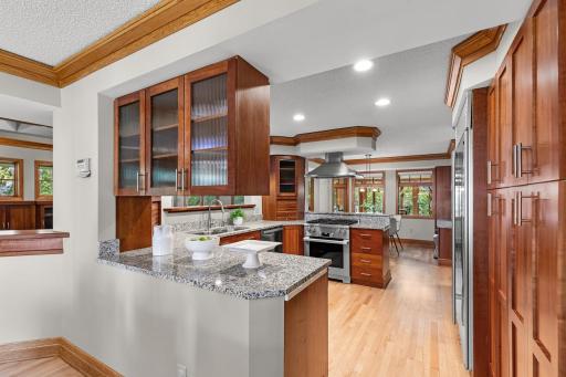 Kitchen has views of Formal Dining, Living and Informal Dining Areas.