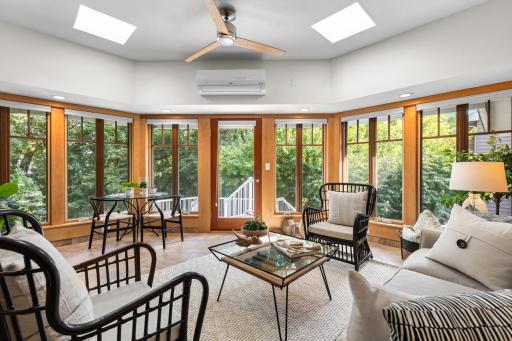 Large Windows with a view of the backyard in the 3-season Porch