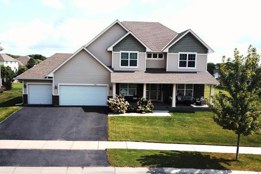 1135 Moers Classic two-story with a grand front porch. See Aerial view showing surrounding green space. City park is behind home. The park acts as an extension of your yard when you are relaxing, playing, or entertaining.