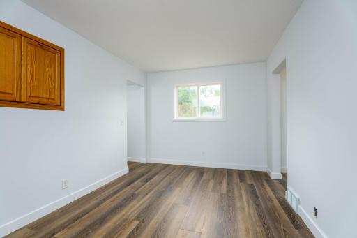 Living Room View Toward Front Entry and Kitchen