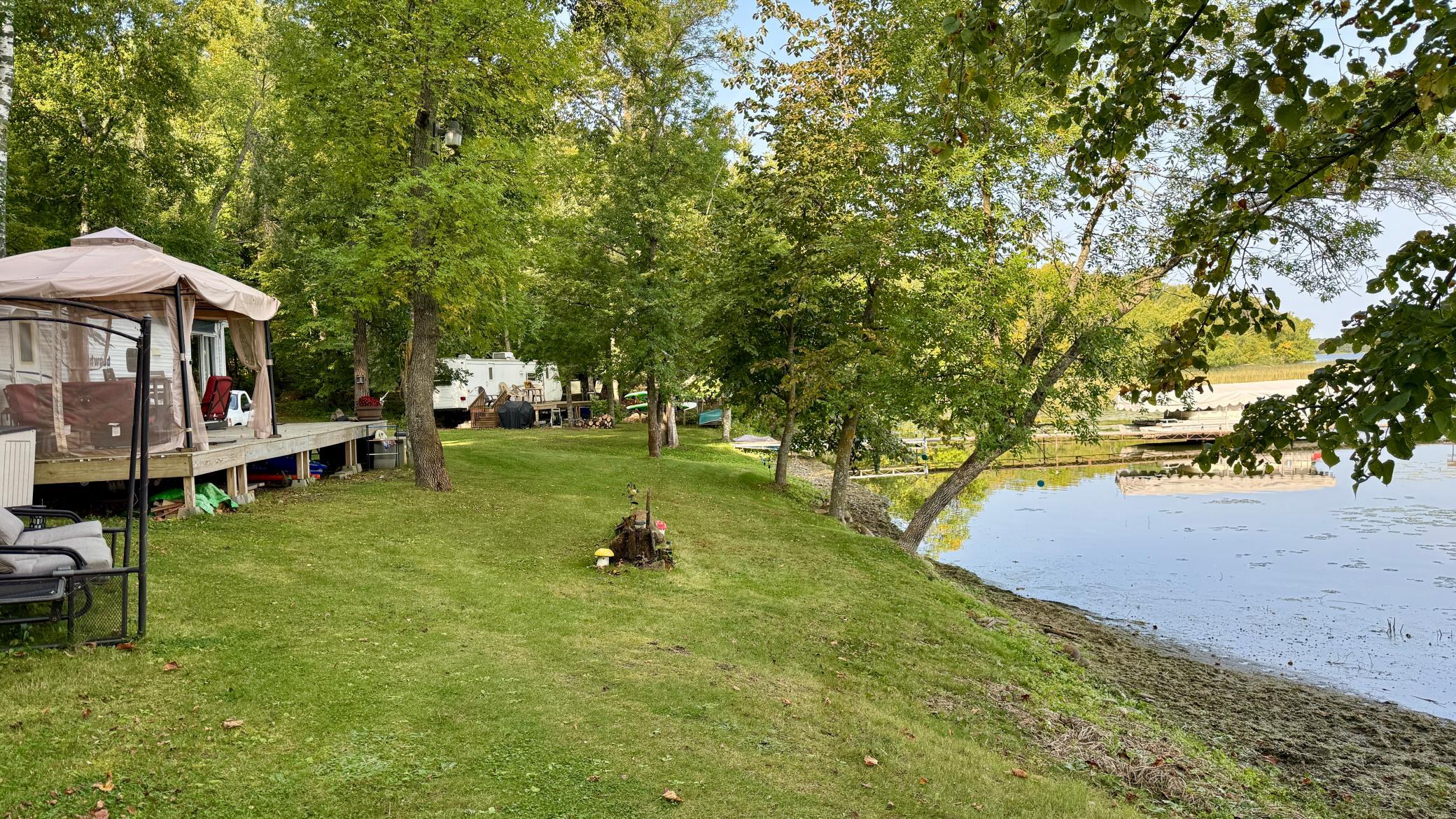 Two campers at the water's edge.JPG