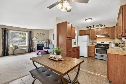 The bright and warm kitchen is clean & functional, and well-appointed.