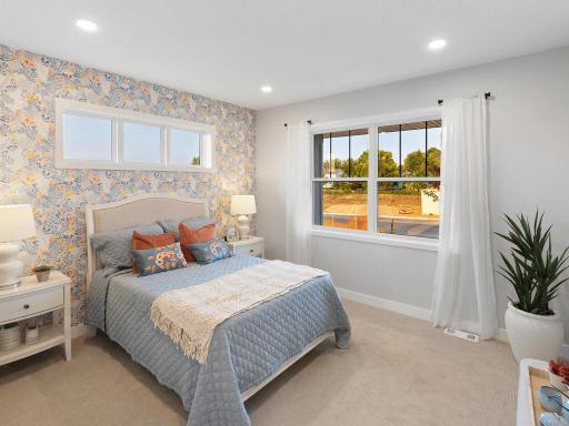 Front bedroom is spacious and offers a walk in closet