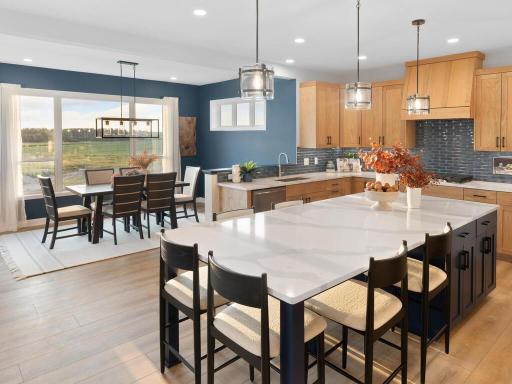 Oversized island seats 6, has great storage and work surface as well.