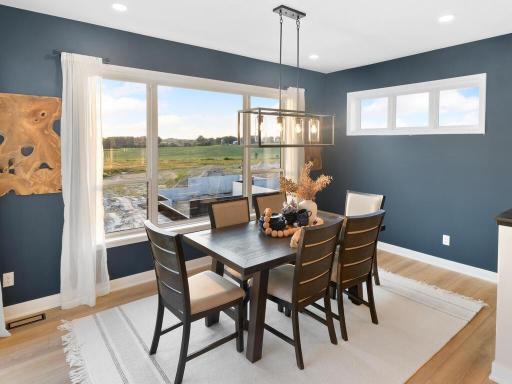 The morning room addition is being utilized as a dining room.