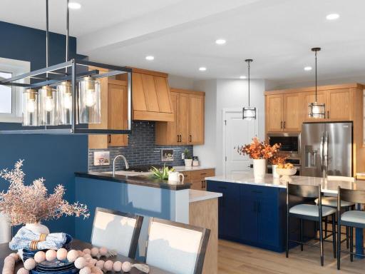 Stunning blues and browns keep the home feeling warm.