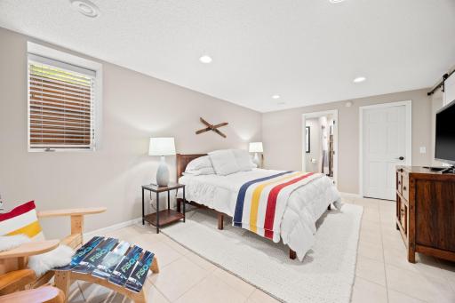 Spacious bedroom 4 in the lower level with adjoing bath