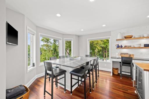 Panoramic Anderson by Renewal windows surround the dining room