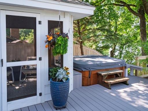 Lakeside gazebo and hot tub are wonderful additions to this property