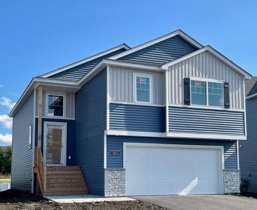 3214 Kady Ave NE- New Construction Home will be ready for move-in 10/21/2025! Highlights include a finished walkout lower level located on a Cul-De-Sac Homesite! Sod, Landscaping, & Irrigation System will be installed soon.