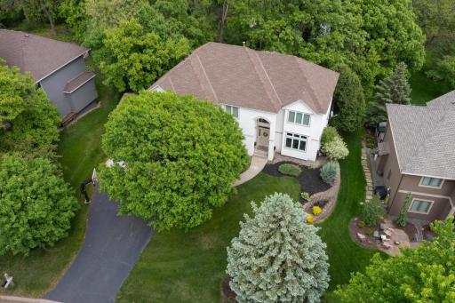 Gorgeous two story on a beautiful wooded in the high demand Longacres Neighborhood.
