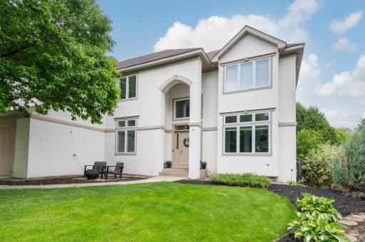 Enjoy this two-story on a private wooded lot with a connection to the neighborhood park.