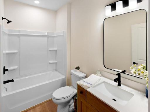 Full bath on the main level near flex room and guest bedroom