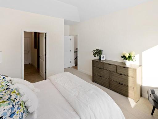 Primary suite with walk-in shower and closet