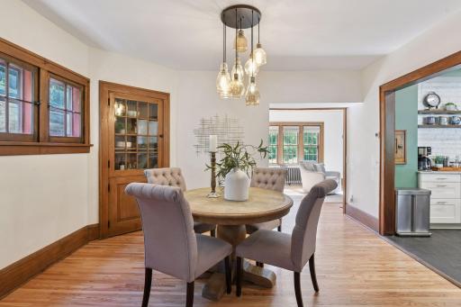 The dining room is open to the living room, the kitchen, and the family room.