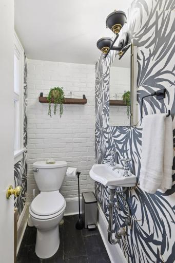 This cute powder room is such a pretty little surprise.