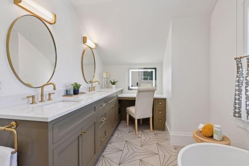 Not only does the new bath have a double vanity, but it has a special third make-up vanity.
