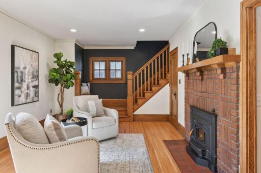 Imagine walking up that staircase with the original hardwood every day.