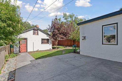 Spacious yard for outdoor dining and playing around.