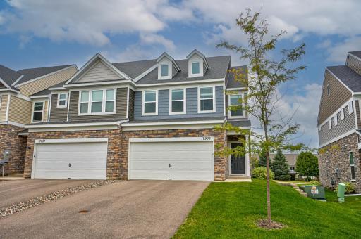 This stunning end-unit townhome offers the perfect balance of style, space, and comfort. A 2-car attached garage with built-in shelving add ease and functionality.