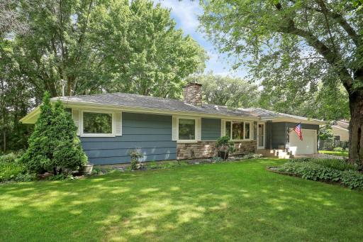 Lovely South facing Minnetonka home on a .35 acre lot situated on a cul-de-sac street. Buyer will receive a one year HSA home warranty at closing!