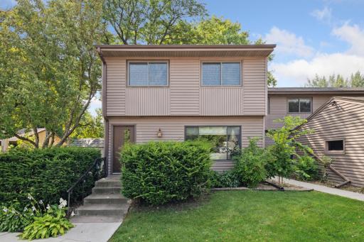 Welcome Home! Rare end unit townhome in walkable location.