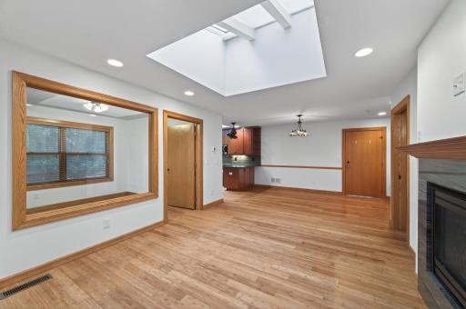 View of the living room with window into flex room