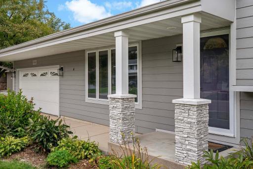 Welcoming covered front porch to put chairs