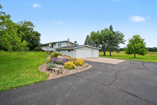 Sprawl out on 2.43 lush acres! This stunning lot is a blank canvasâperfect for adding your dream pool, pole barn, or garden. Highlighted by the beautiful sunroom, large deck, patio, & a deep 3-car garage, this has the ultimate country estate feel.