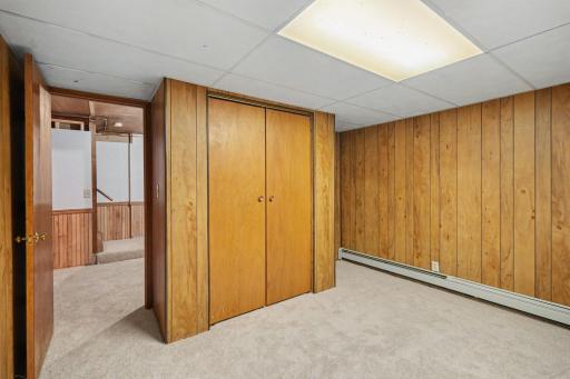 Expand your living space with this lower-level flex room, including a generous closet for extra storage. Perfect for a hobby room, private office, playroom, exercise studio, or a non-conforming bedroomâthe possibilities are endless!