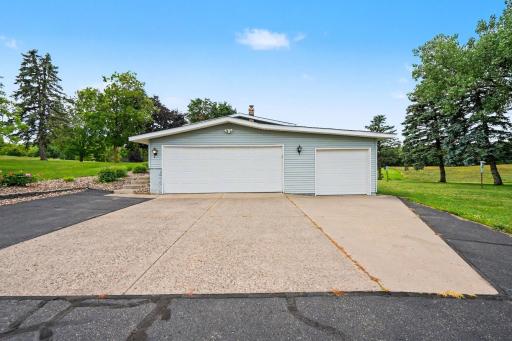 Sprawling 2.43-acre lot offers a scenic country oasis. Includes a deep 3-car garage with bonus storage space. Prime commuter location with fast highway access, sitting minutes from the St. Croix river border, Hudson, and Stillwater. See it today!