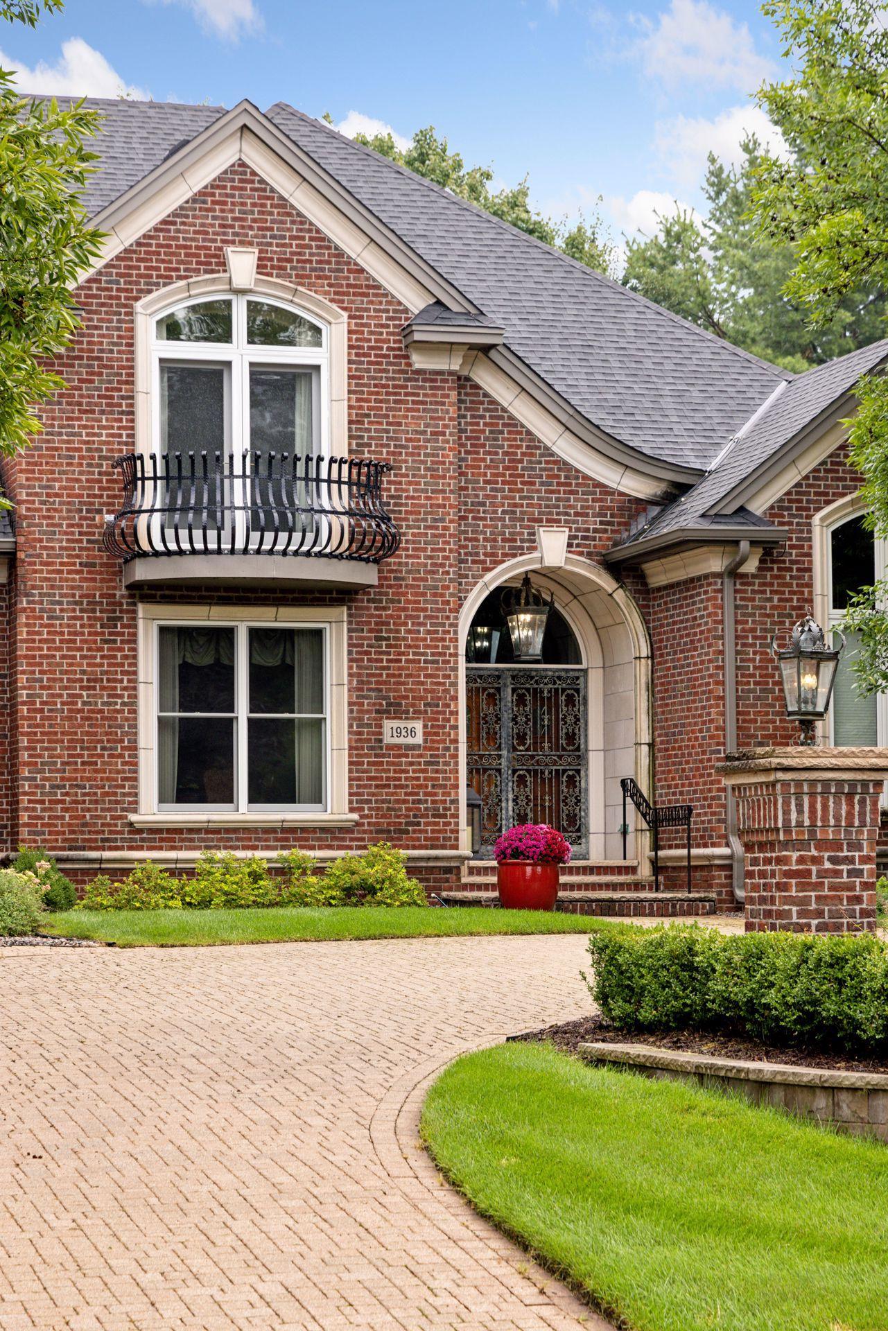 The entire exterior is brick and stone