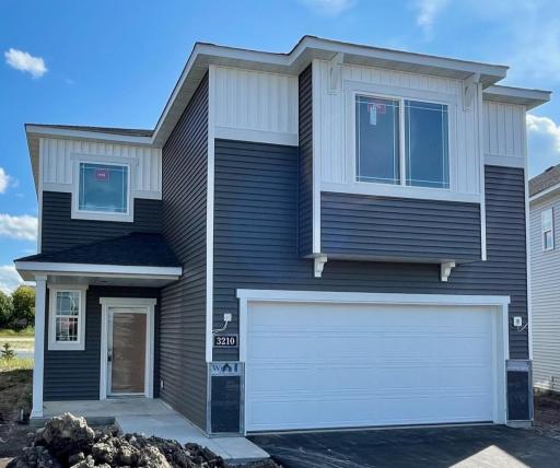 3210 Kady Ave NE- New Construction Home will be ready for move-in 10/30/25! Located on a Cul-De-Sac Homesite. Stone accents will be installed soon.