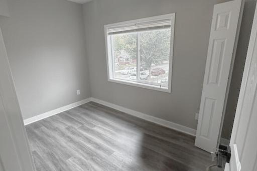 4010 Dupont Upper Bedroom 1A.jpeg